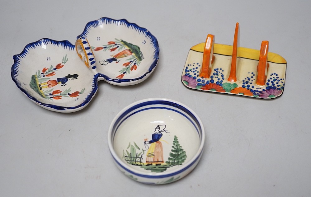 A Clarice Cliff Bizarre Gayday pattern toast rack and a Quimper dish and bowl, toast rack 13cms long x 9cms wide